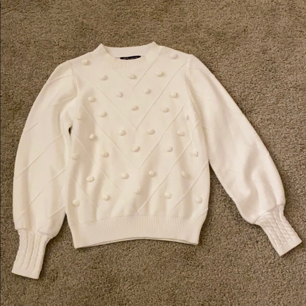 White pompom sweater
